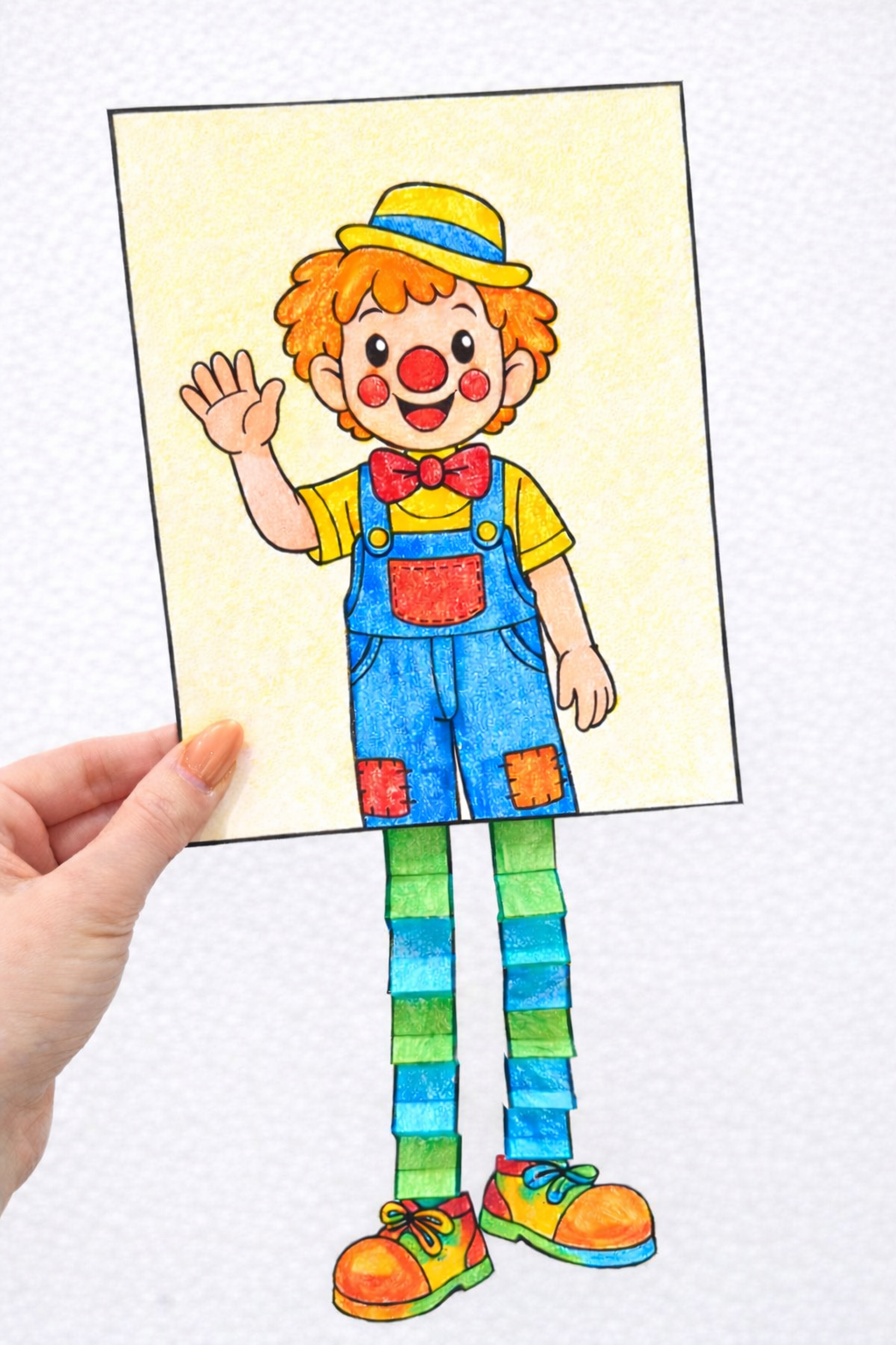 You are currently viewing Clown mit Wackelbeinen: schnell und einfach mit BASTELVORLAGE zum Ausdrucken